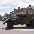 A military vehicle drives right over the roundabout, Quettehou, Sainte-Marie-du-Mont and the D-Day Museum, Utah Beach - 4th June 2026