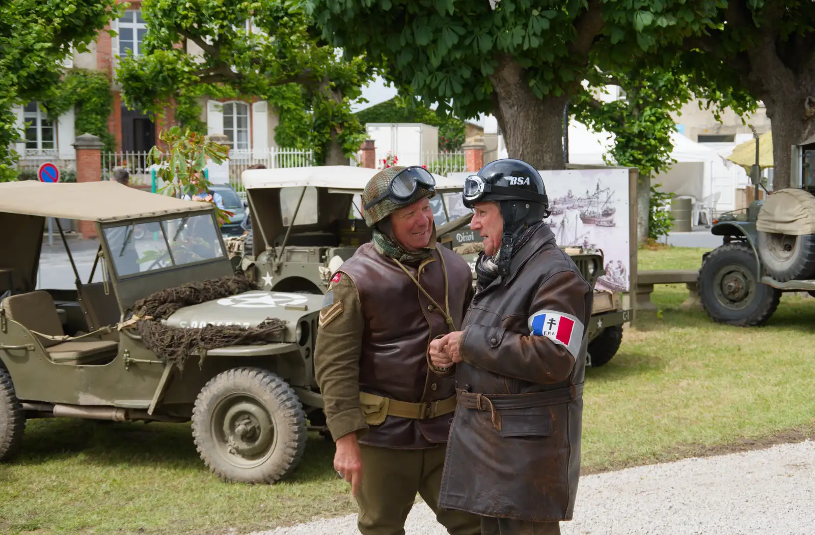 Two re-enactors have a chat, from Quettehou, Sainte-Marie-du-Mont and the D-Day Museum, Utah Beach - 4th June 2026