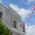 A run-down 1930s building flies the flags, Quettehou, Sainte-Marie-du-Mont and the D-Day Museum, Utah Beach - 4th June 2026