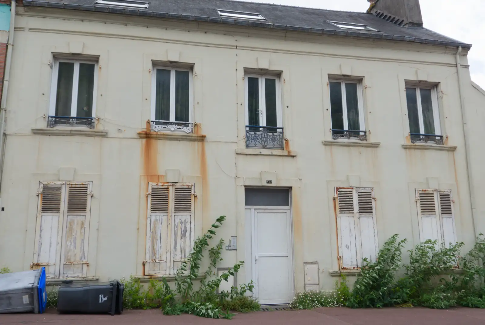 Rust stains on a big house, from Quettehou, Sainte-Marie-du-Mont and the D-Day Museum, Utah Beach - 4th June 2026