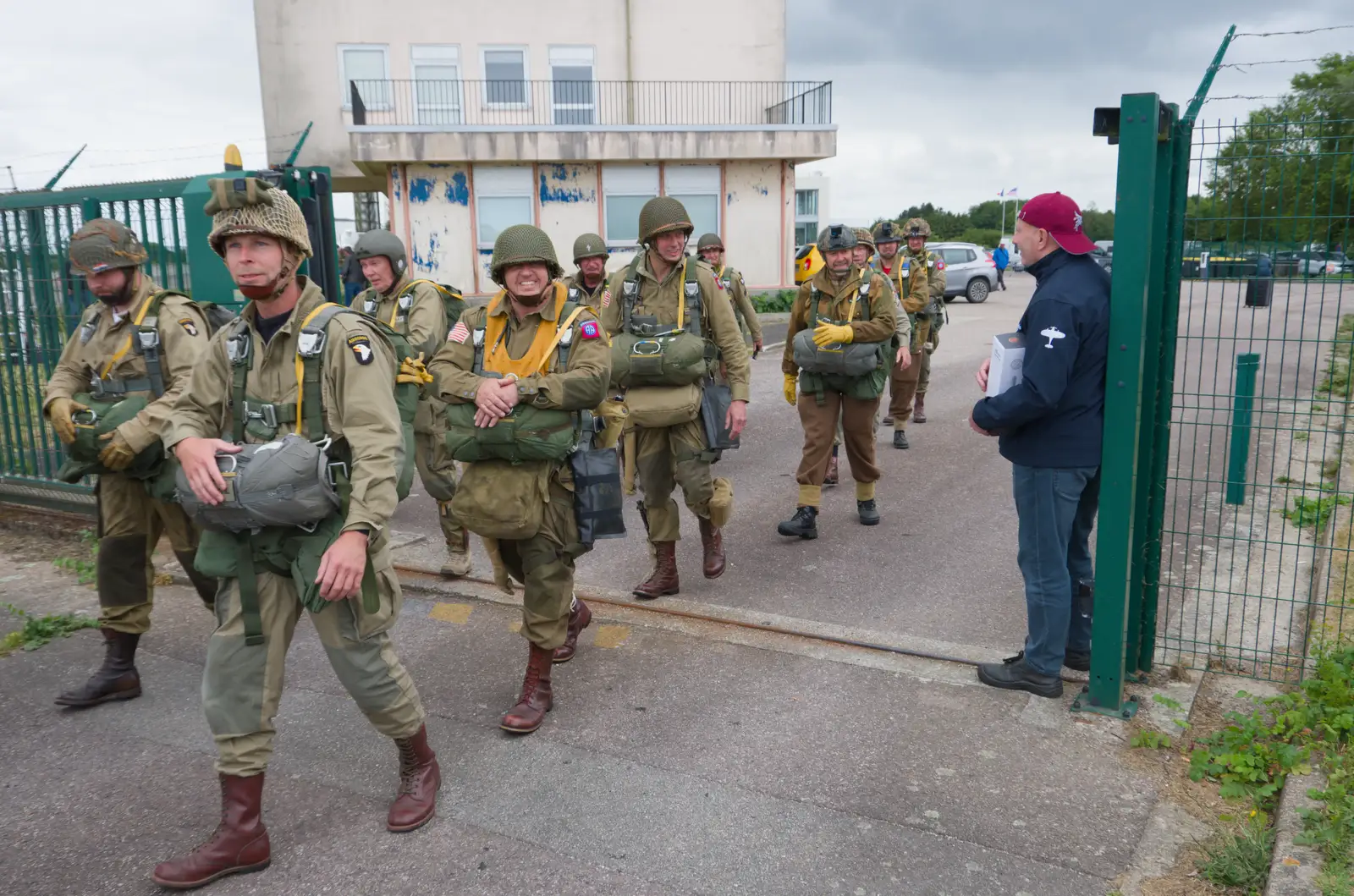 Keith holds open the gate for the next group, from A D-Day Veteran's Dakota Flight, Cherbourg, Normandy - 5th June 2026