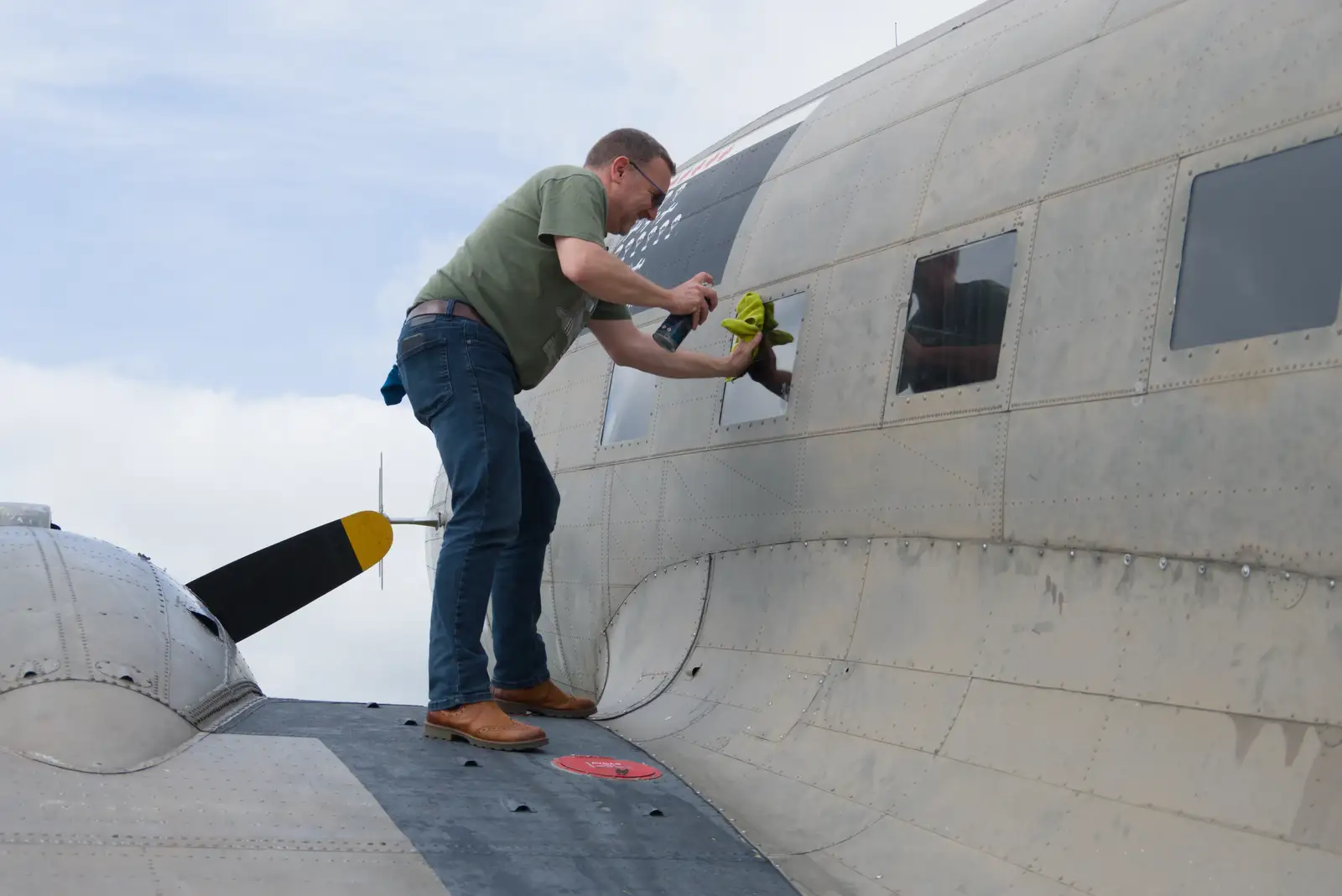 Clive does a spot of window cleaning, from Cité de lar Mer and a Dakota Flight Home, Cherbourg - 7th June 2026