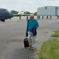 Paul hauls his luggage across the airfield, Cité de lar Mer and a Dakota Flight Home, Cherbourg - 7th June 2026