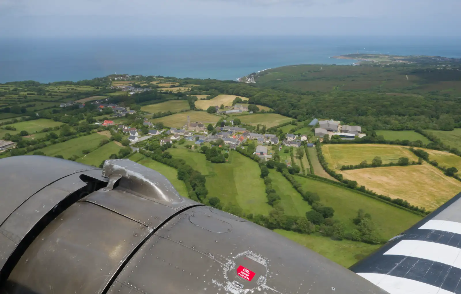 A view of Normandy over the engine nacelle, from Cité de lar Mer and a Dakota Flight Home, Cherbourg - 7th June 2026