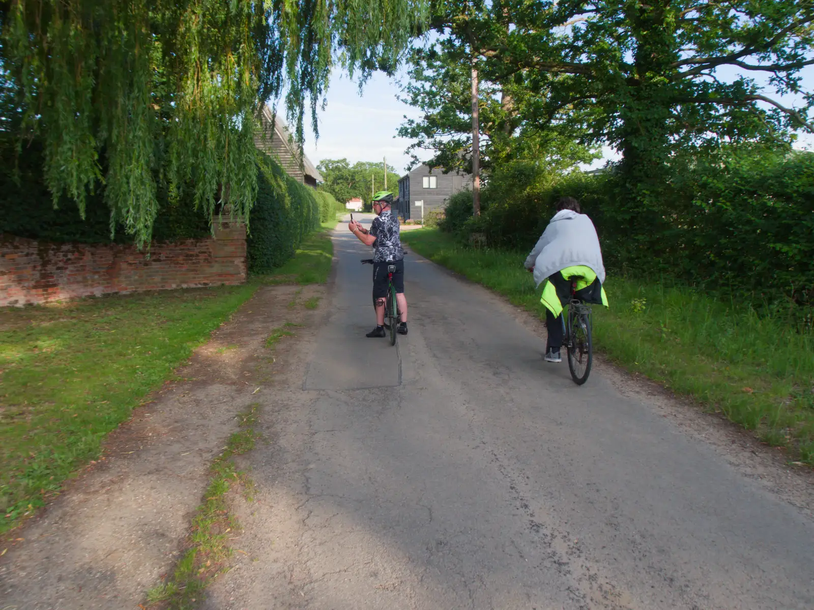 Gaz stops to take a photo of Flemings Hall, from The BSCC Does The Lion, Debenham - 18th June 2026