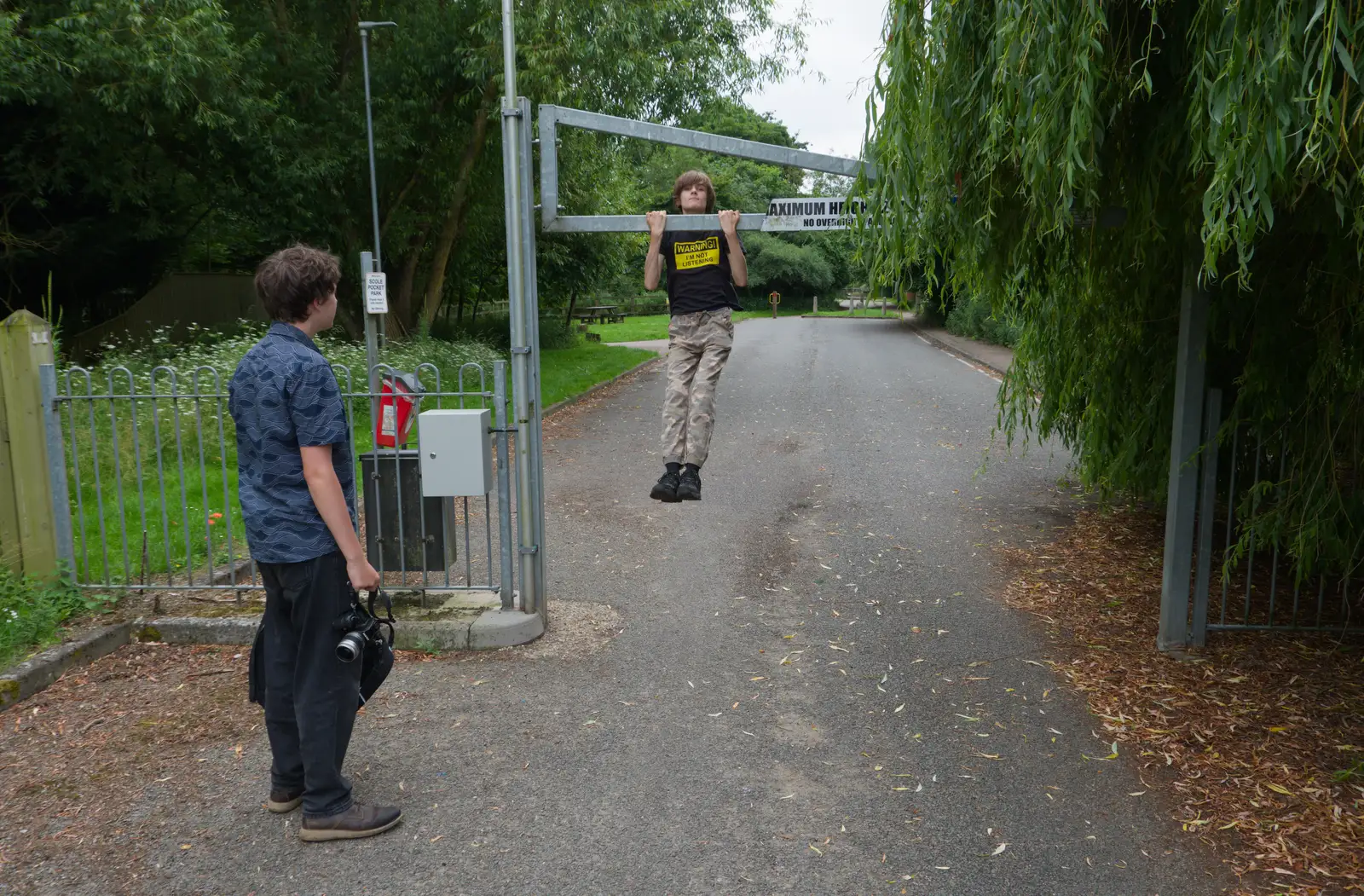 Harry does a sort-of pull up at Scole Pocket Park, from A Father's Day Pub Crawl, Ampersand Tap, Diss - 21st June 2026