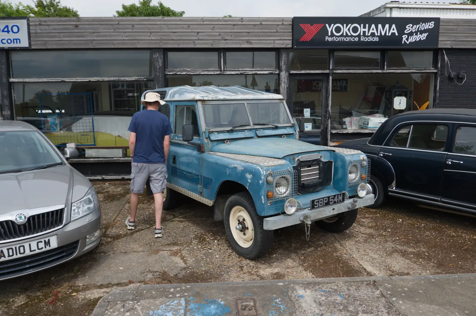The Boy Phil looks at a vintage Land Rover, from A Father's Day Pub Crawl, Ampersand Tap, Diss - 21st June 2026
