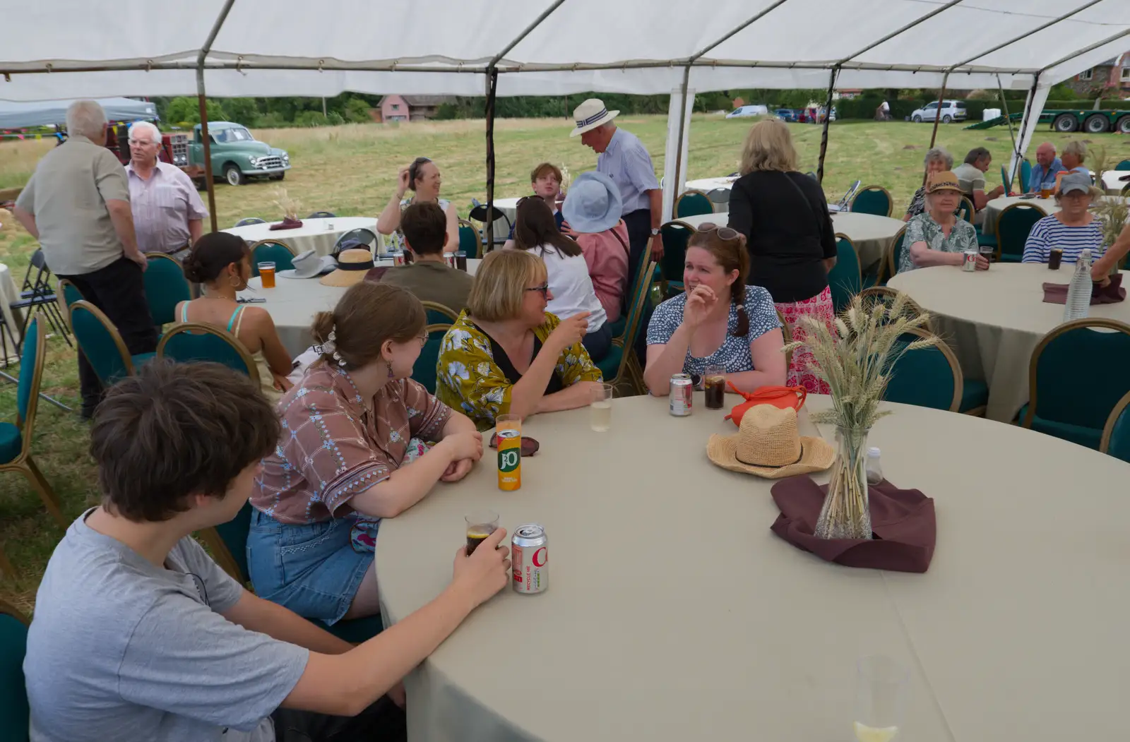 Isobel chats under the marquee, from The Return of the Hog Roast, Thrandeston, Suffolk - 28th June 2026