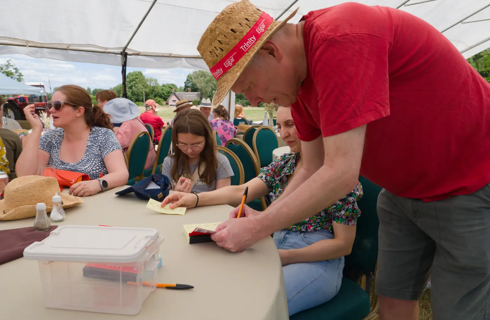 Bill fills in raffle-ticket details, from The Return of the Hog Roast, Thrandeston, Suffolk - 28th June 2026