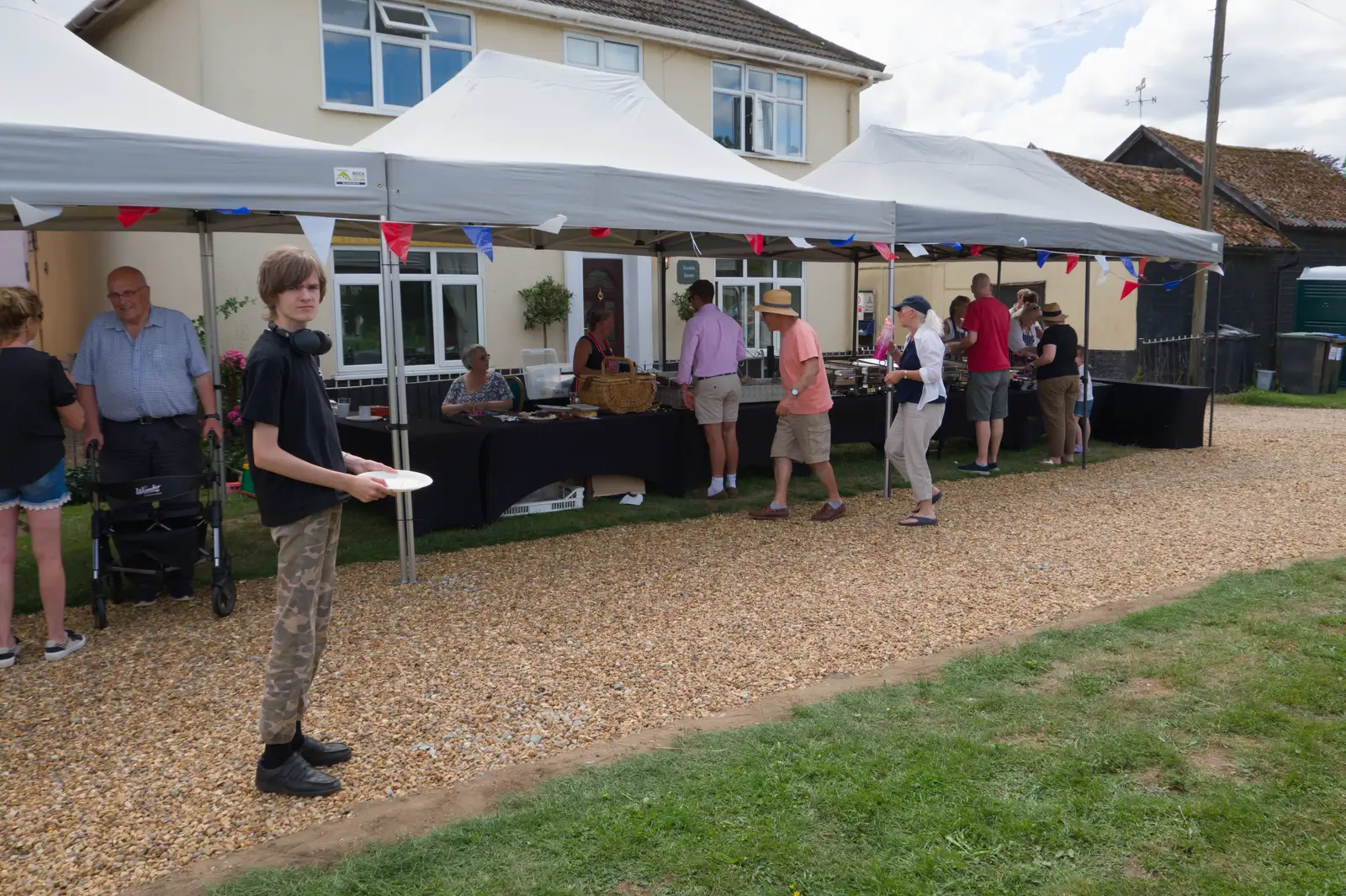 Harry wanders around looking for seconds, from The Return of the Hog Roast, Thrandeston, Suffolk - 28th June 2026
