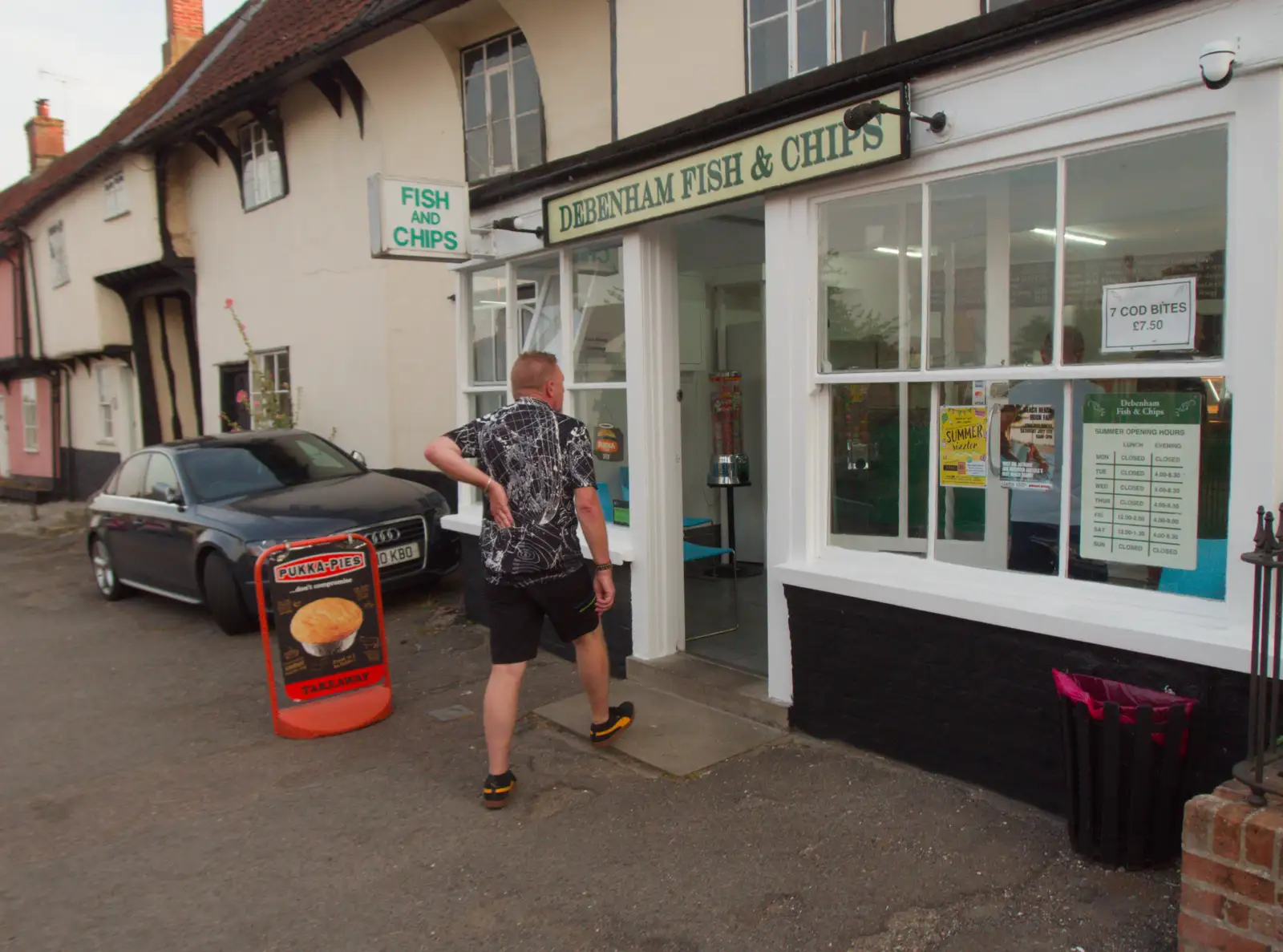 Gaz heads into Debenham Fish and Chips, from Sausage and Chips in Debenham, Suffolk - 9th July 2026