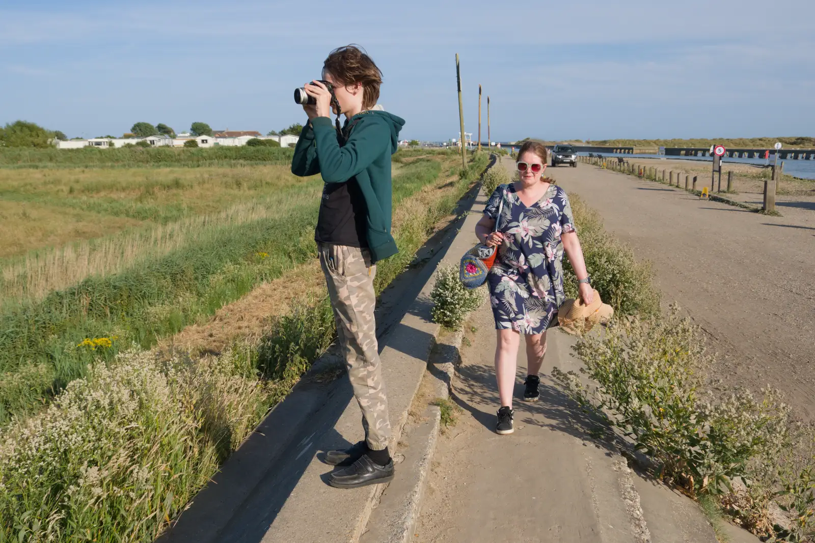 Harry takes a photo from the sea wall, from Harry's Karate Kamp, Harbour Campsite, Southwold - 12th July 2026