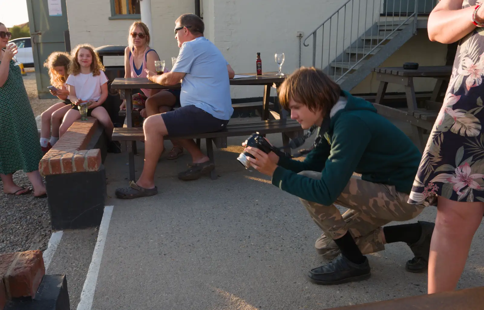 Harry checks some photos, from Harry's Karate Kamp, Harbour Campsite, Southwold - 12th July 2026