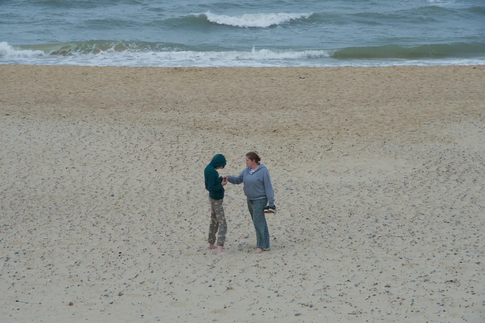 Harry shows Isobel a thing that he's found, from Harry's Karate Kamp, Harbour Campsite, Southwold - 12th July 2026
