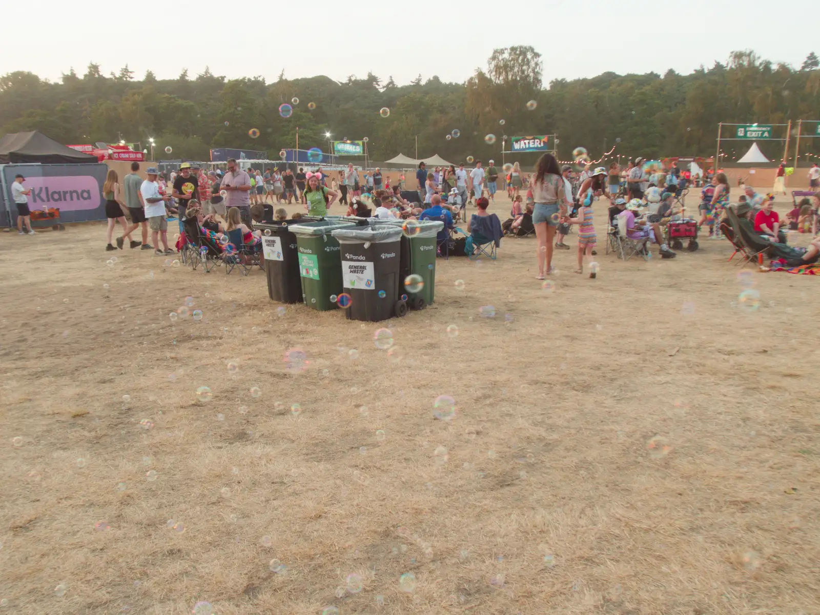 Bubbles tease the dry grass with their moisture, from Latitude's Twentieth Edition, Henham Park, Suffolk - 25th July 2026
