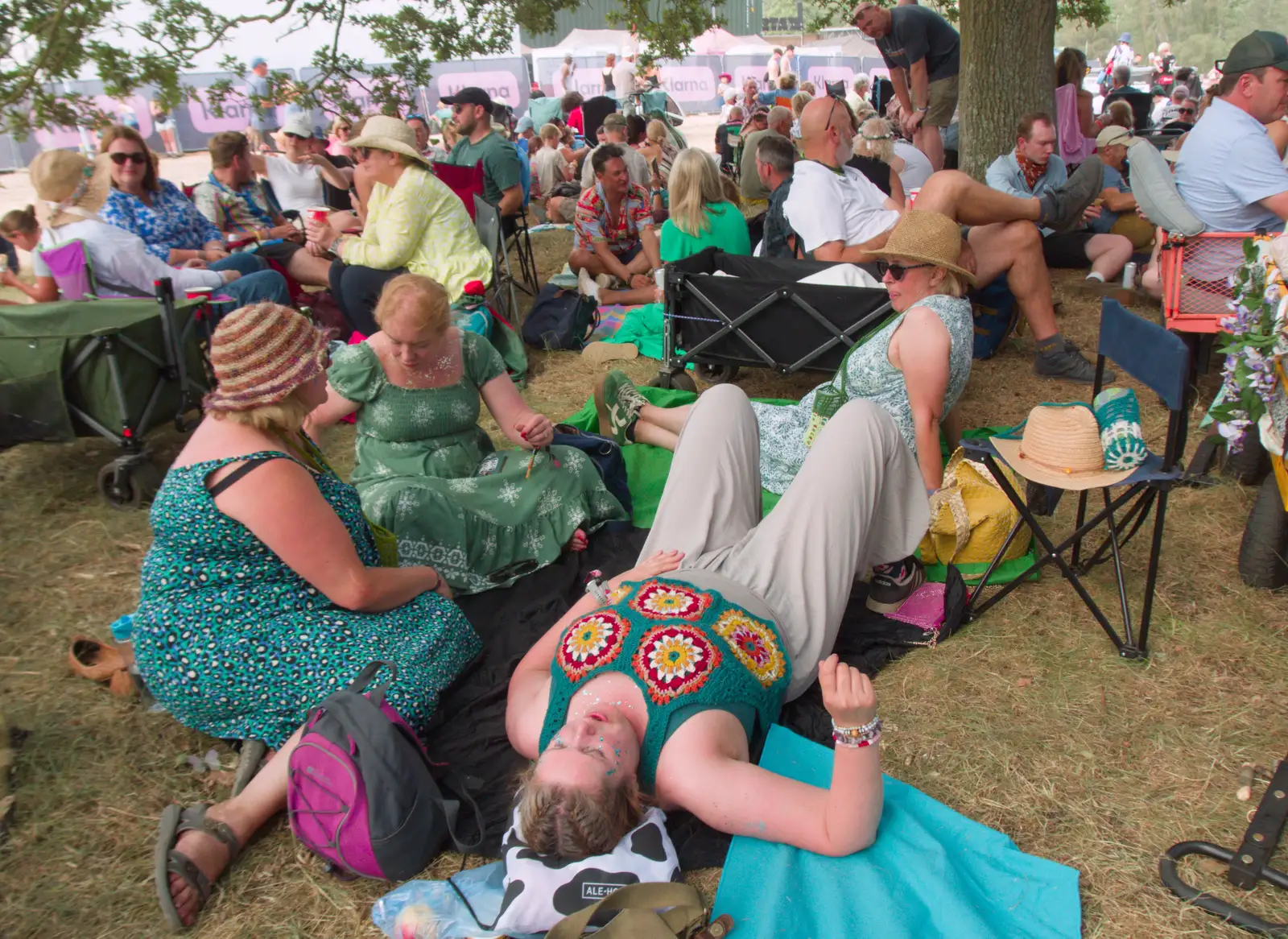 Isobel has a go at lying down under the tree, from Latitude's Twentieth Edition, Henham Park, Suffolk - 25th July 2026