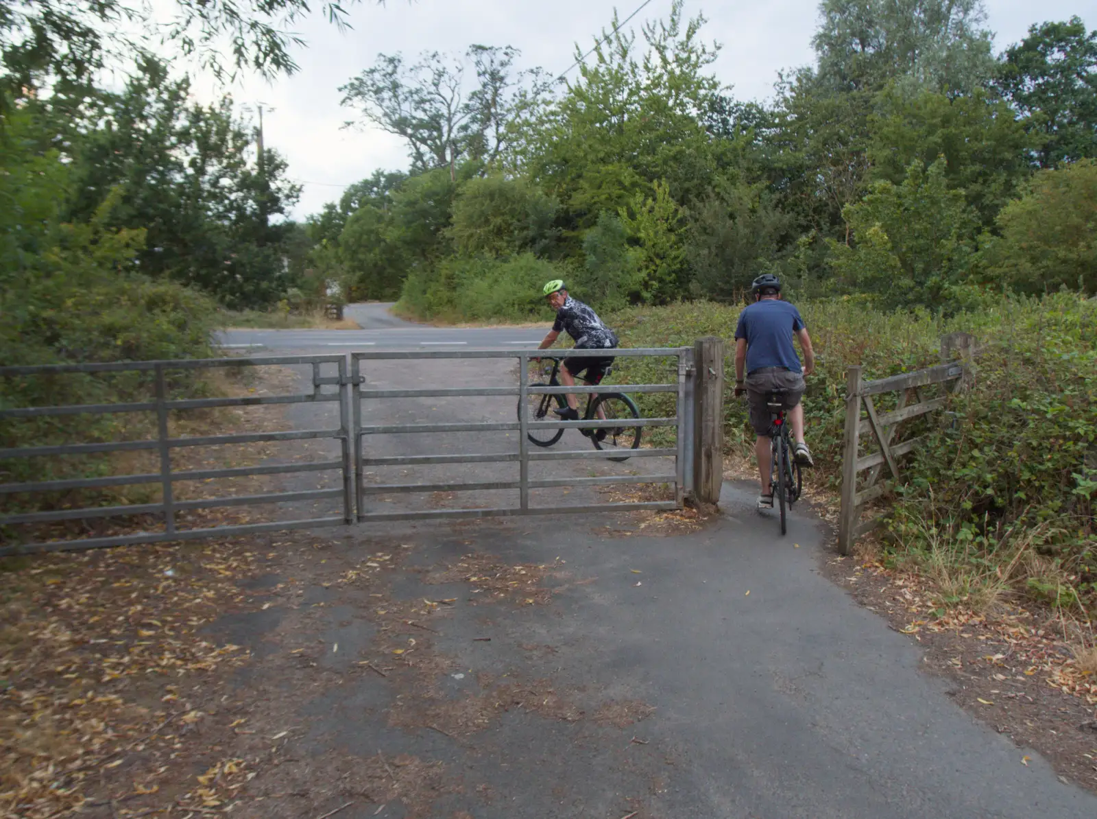 Gaz and Phil head across the A140, from A July Miscellany: Scole and a Ride To Pulham, Norfolk - 30th July 2026