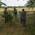 Isobel climbs over a gate, A July Miscellany: Scole and a Ride To Pulham, Norfolk - 30th July 2026