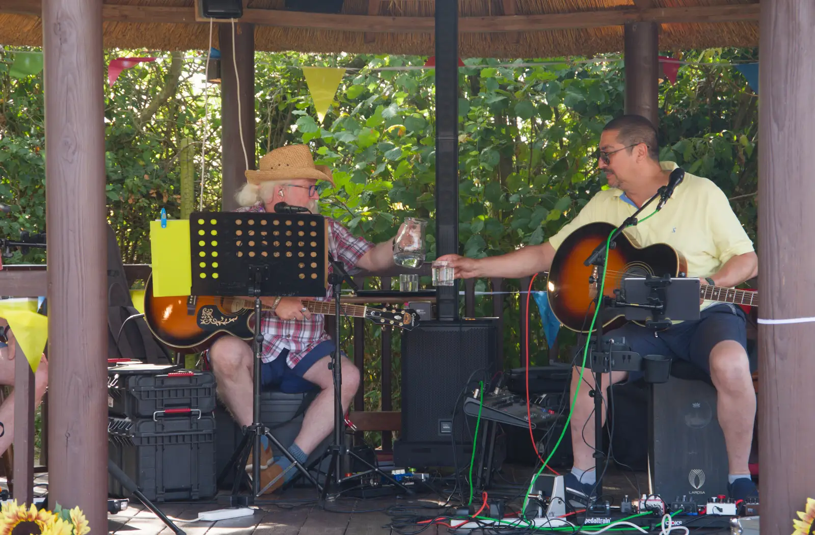 The Colchester Buskers pause for a glass of water, from Music in the Beer Garden, Trowel and Hammer, Cotton - 2nd August 2026