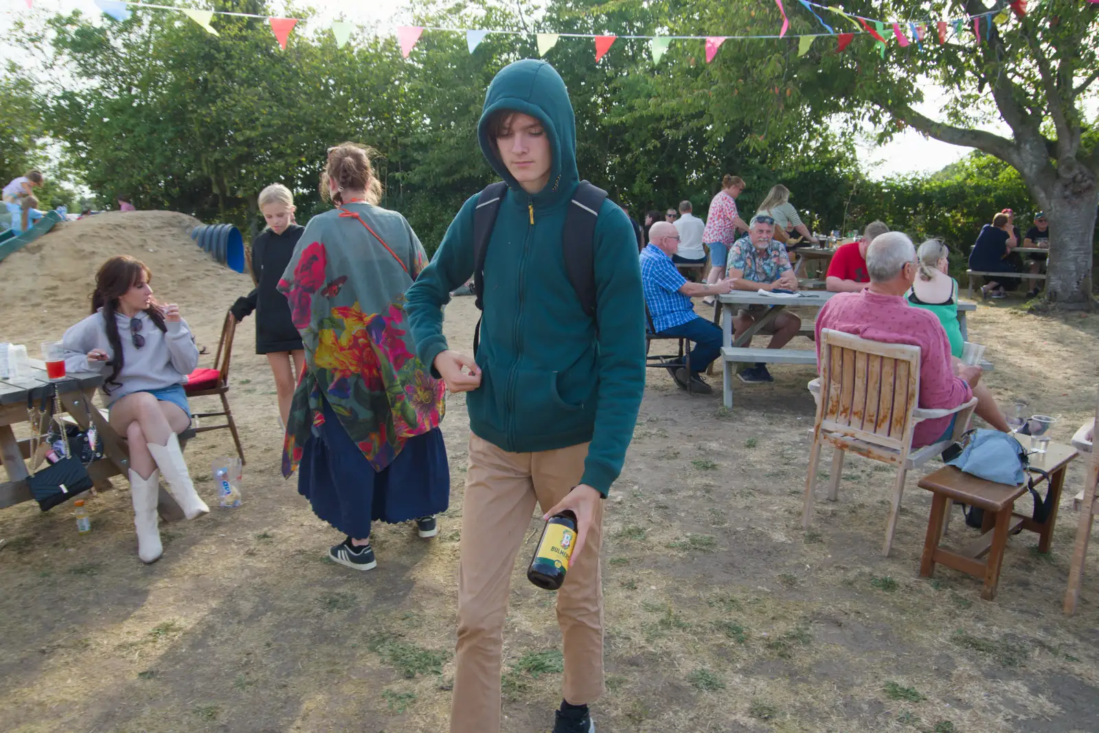 Harry heads off with an empty Bulmers bottle, from Music in the Beer Garden, Trowel and Hammer, Cotton - 2nd August 2026