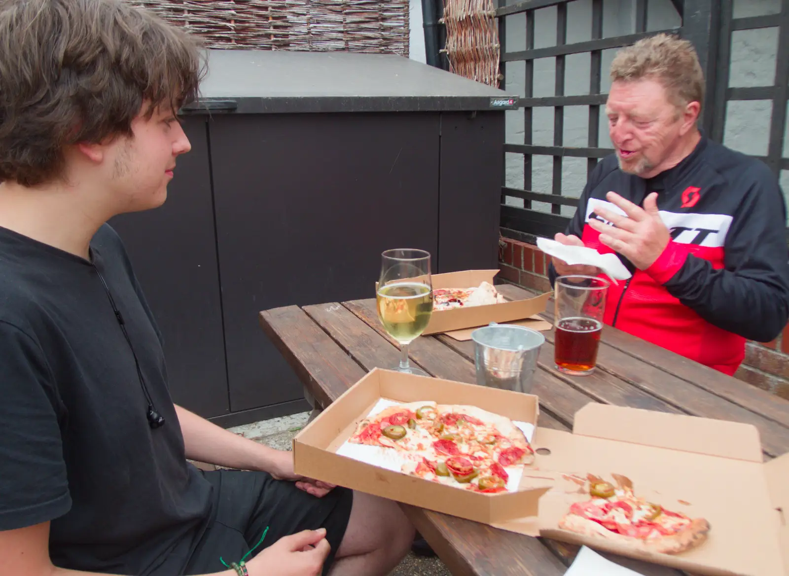 Fred scores some pizza from the horsebox van, from An Alternate Reality, and the BSCC in Harleston, Norfolk - 6th August 2026
