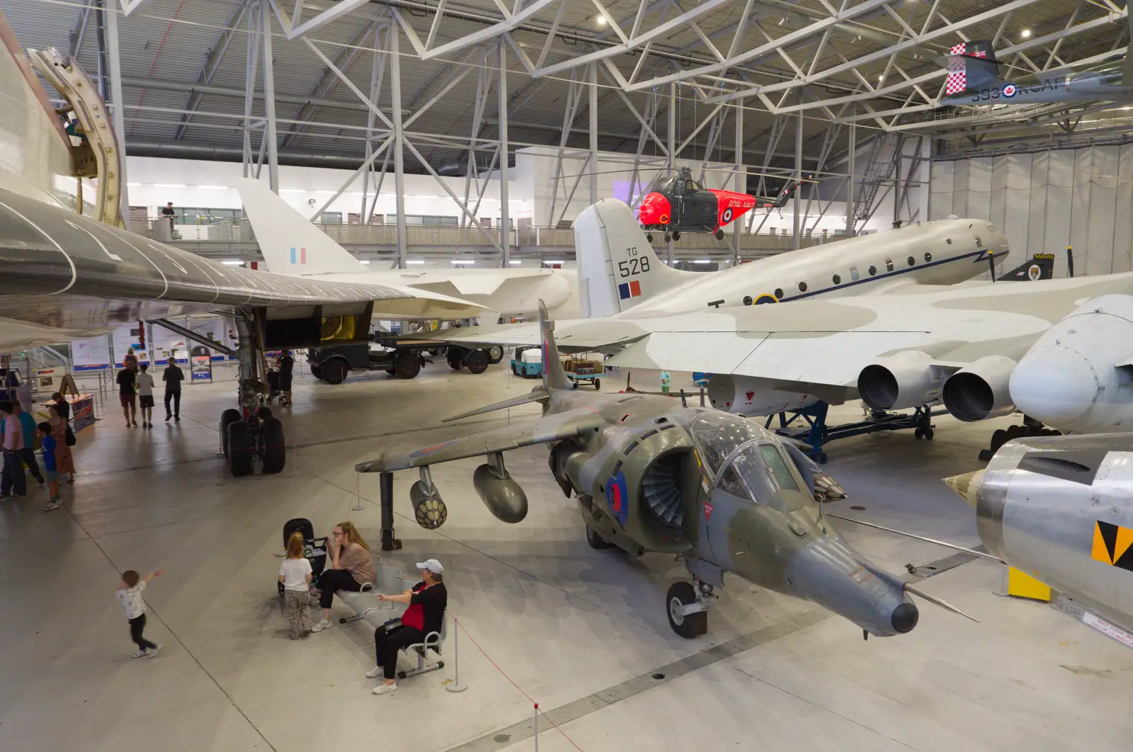 A Sea Harrier is dwarfed by giant aircraft, from A Visit to IWM Duxford, Cambridgeshire - 17th August 2026