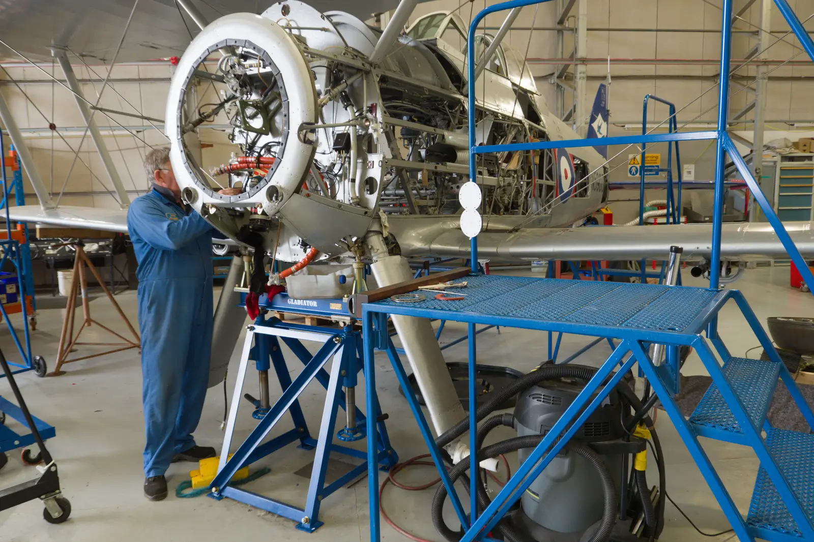 An engineer works on the Gladiator, from A Visit to IWM Duxford, Cambridgeshire - 17th August 2026