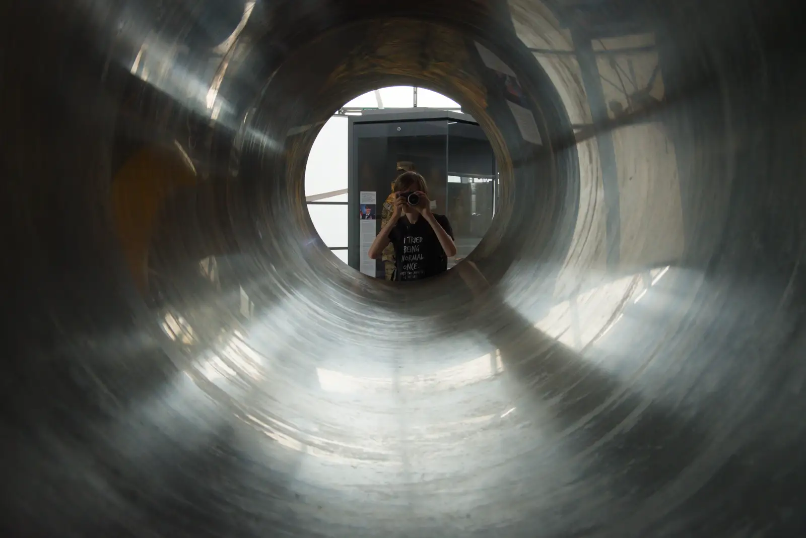 Harry takes a photo down part of a supergun, from A Visit to IWM Duxford, Cambridgeshire - 17th August 2026