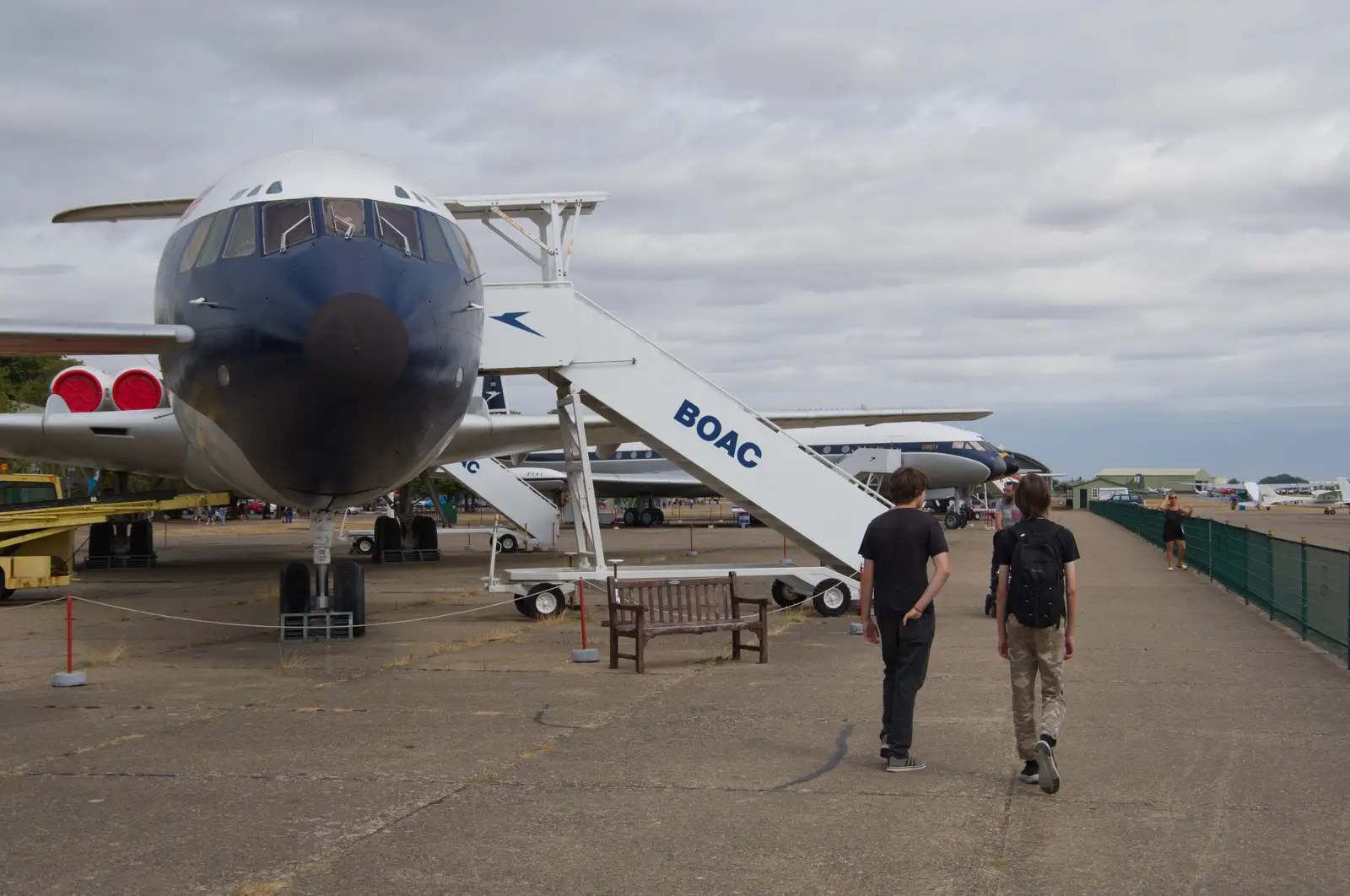 The boys wander past the outdoor British planes, from A Visit to IWM Duxford, Cambridgeshire - 17th August 2026