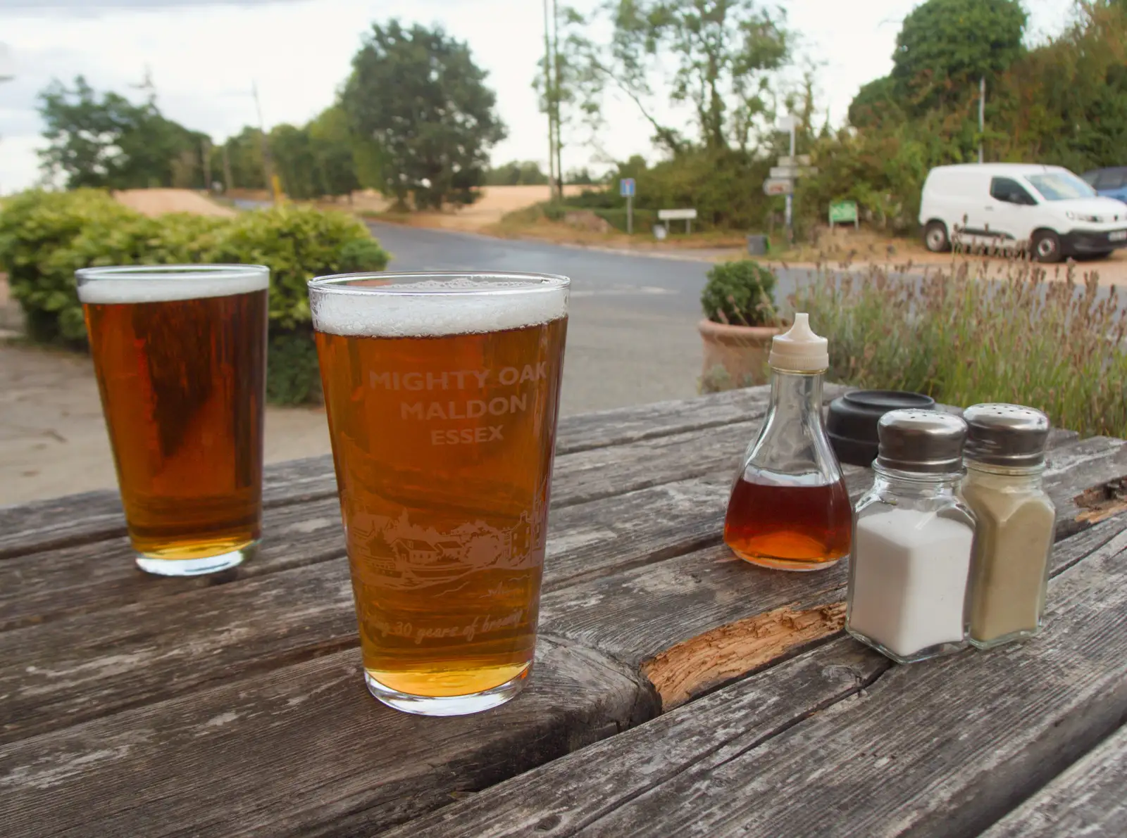 A couple of pints of beer at the Four Horseshoes, from A Wet Ride to the Four Horseshoes, Thornham - 19th August 2026