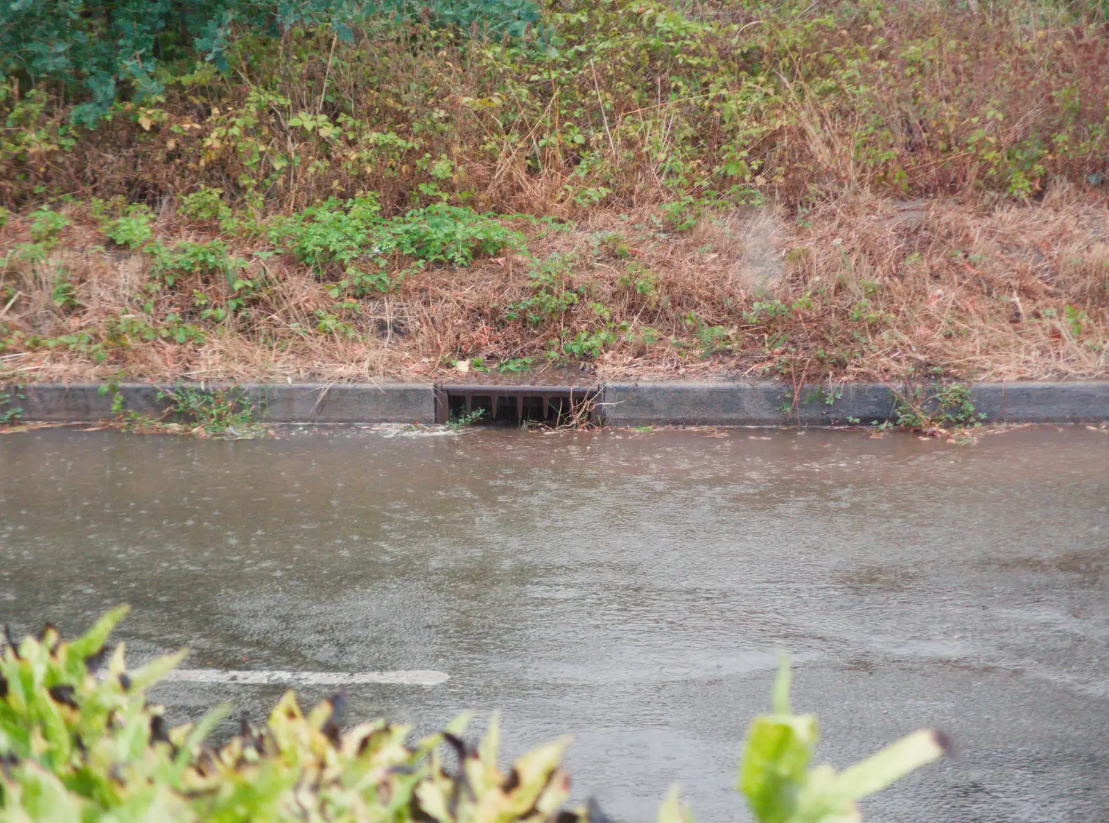 Within minutes, the drains are filling up, from A Wet Ride to the Four Horseshoes, Thornham - 19th August 2026