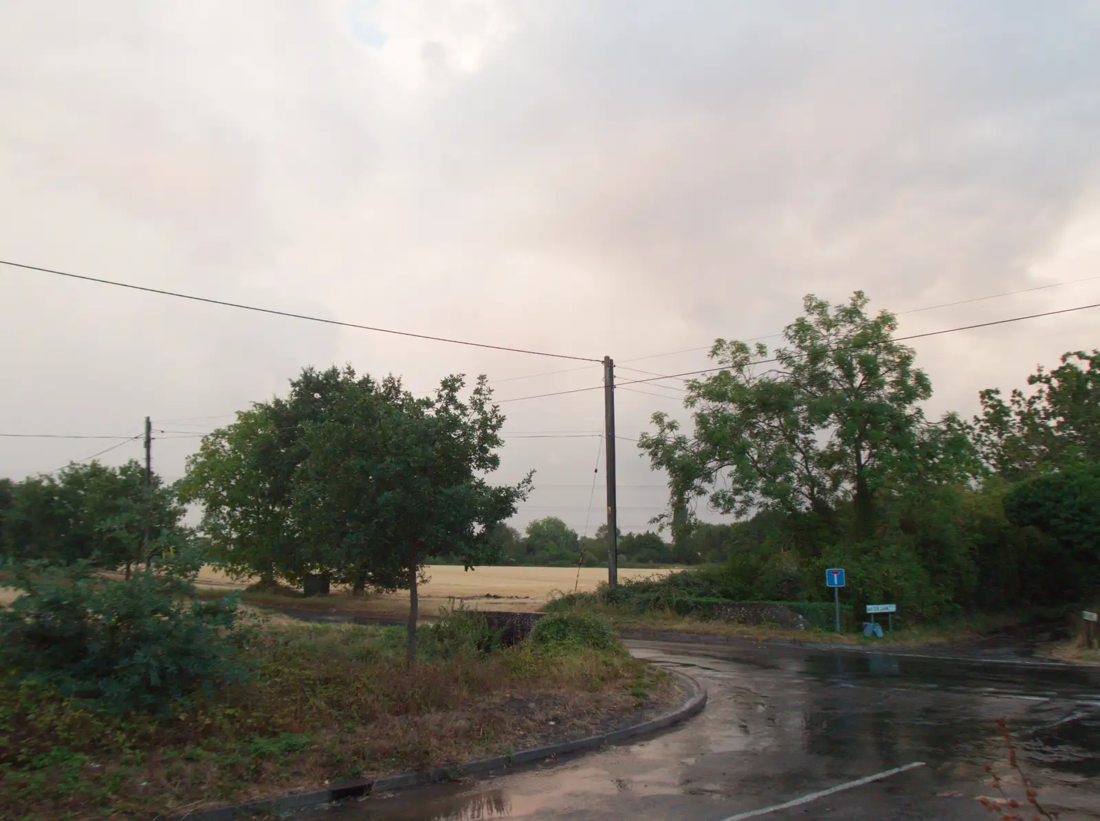 Rain over the fields, from A Wet Ride to the Four Horseshoes, Thornham - 19th August 2026