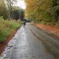 Mick heads off up the hill out of Thornham, A Wet Ride to the Four Horseshoes, Thornham - 19th August 2026