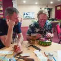 One of the quiz-setters brings over a tin of stuff, A Village Hall Quiz and a Dead Pub, Worlingworth - 21st August 2026