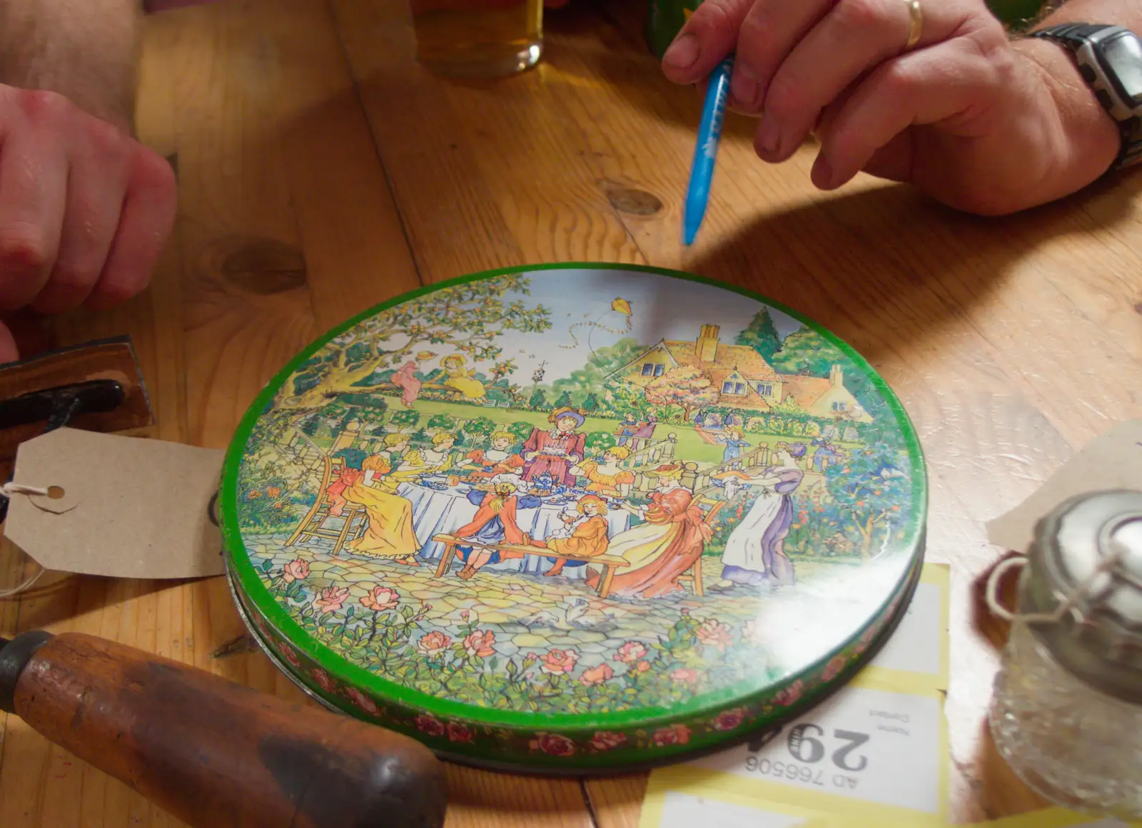 We get shown a biscuit tin with shagging dogs on it, from A Village Hall Quiz and a Dead Pub, Worlingworth - 21st August 2026