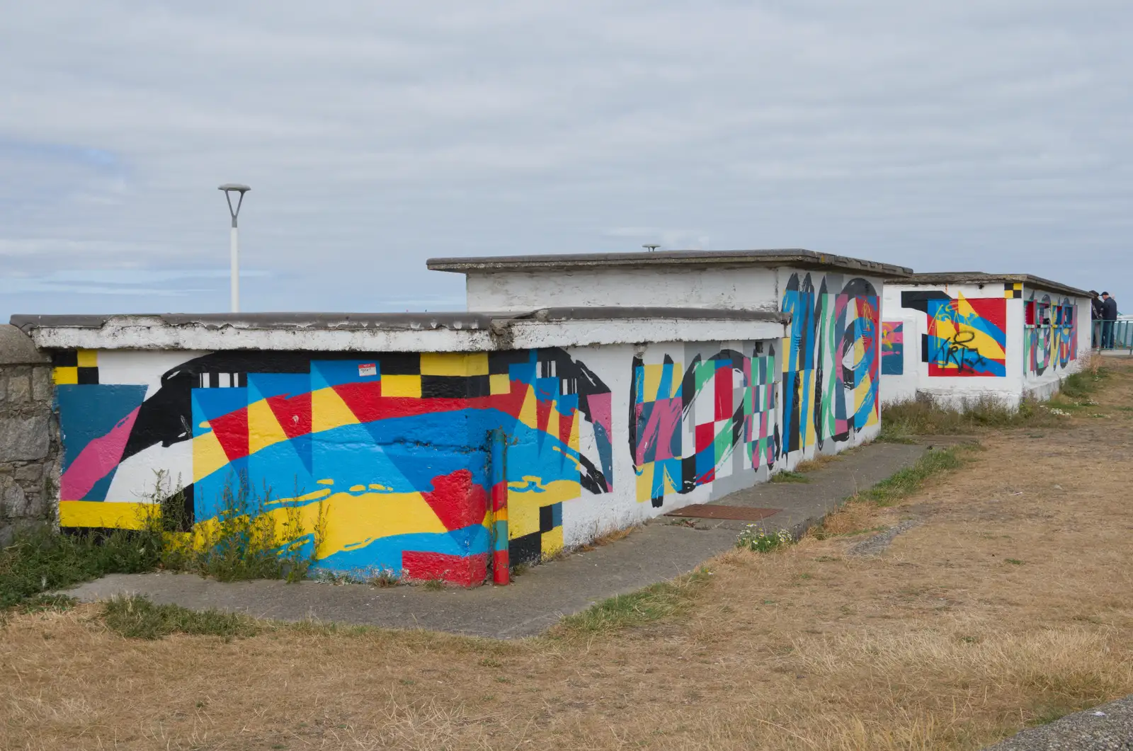 Graffiti buildings near the east pier, from The Ukulele Hooley, People's Park, Dún Laoghaire, Ireland - 22nd August 2026