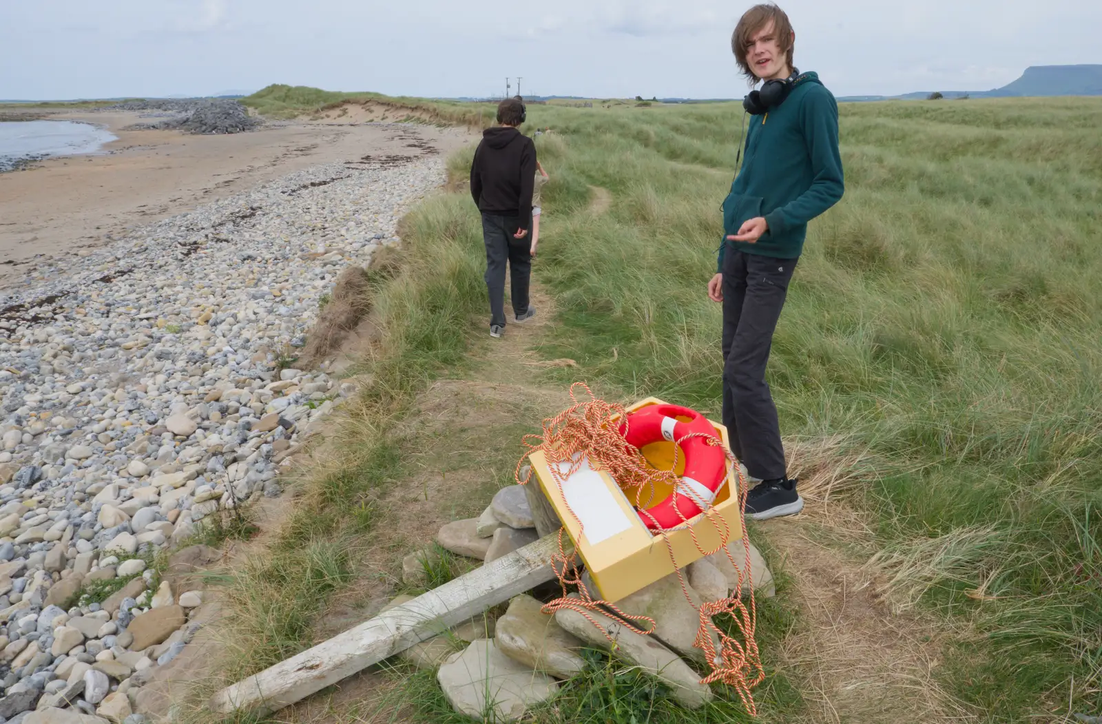 Harry stands by a wrecked lifebuoy , from Clogherrevagh and Strandhill, Leitrim, Ireland - 24th August 2026