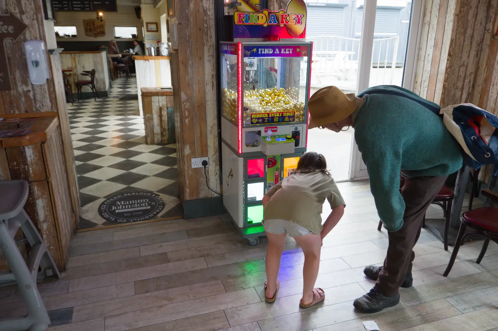 Rachel has a go at the Claw Machine, from Clogherrevagh and Strandhill, Leitrim, Ireland - 24th August 2026