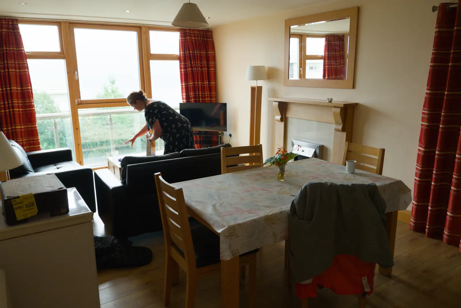 Isobel picks something up in the apartment, from Manorhamilton, Sligo and Streedagh Beach, Leitrim, Ireland - 26th August 2026