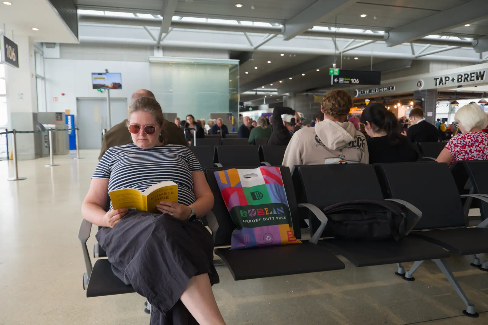 Isobel reads book, from Castle Dargan Golf, Glangelvin and Pizza in Dún Laoghaire, Ireland - 28th August 2026