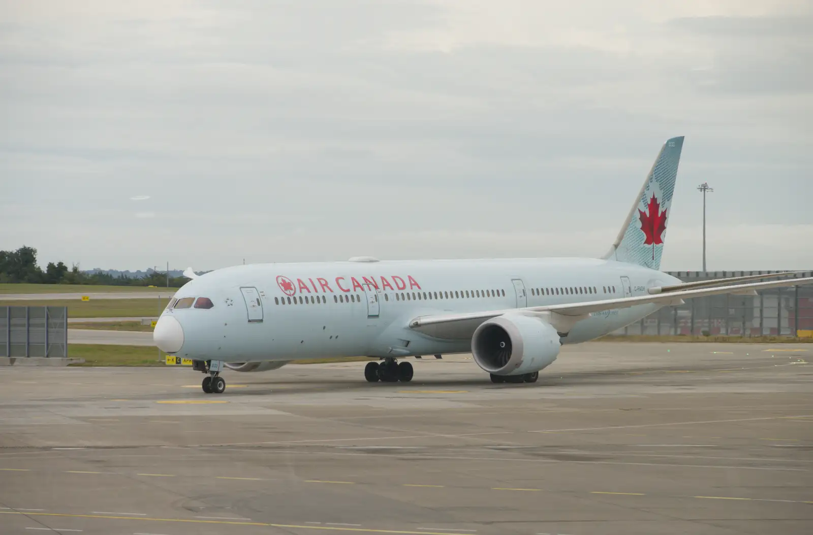 An Air Canada 787 taxis up to its gate, from Castle Dargan Golf, Glangelvin and Pizza in Dún Laoghaire, Ireland - 28th August 2026