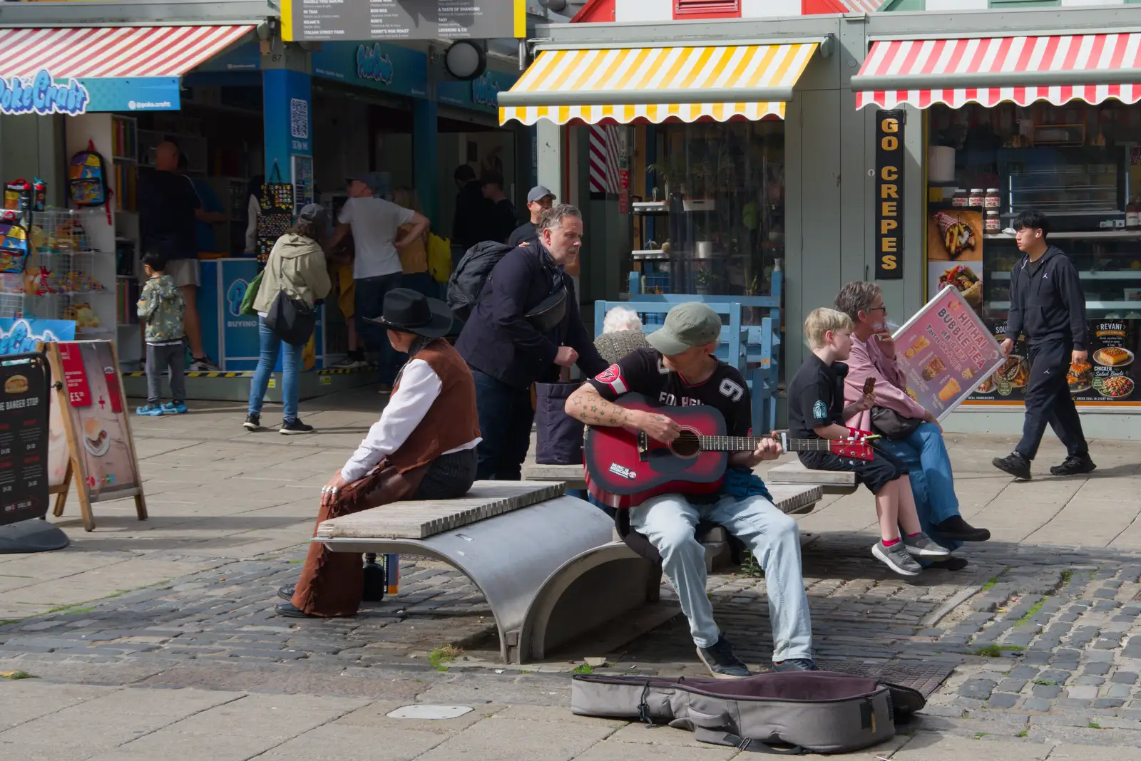 There's some dude playing guitar near the market, from Shoe Shopping in Norwich, and Italia Fest at the Oaksmere - 5th September 2026