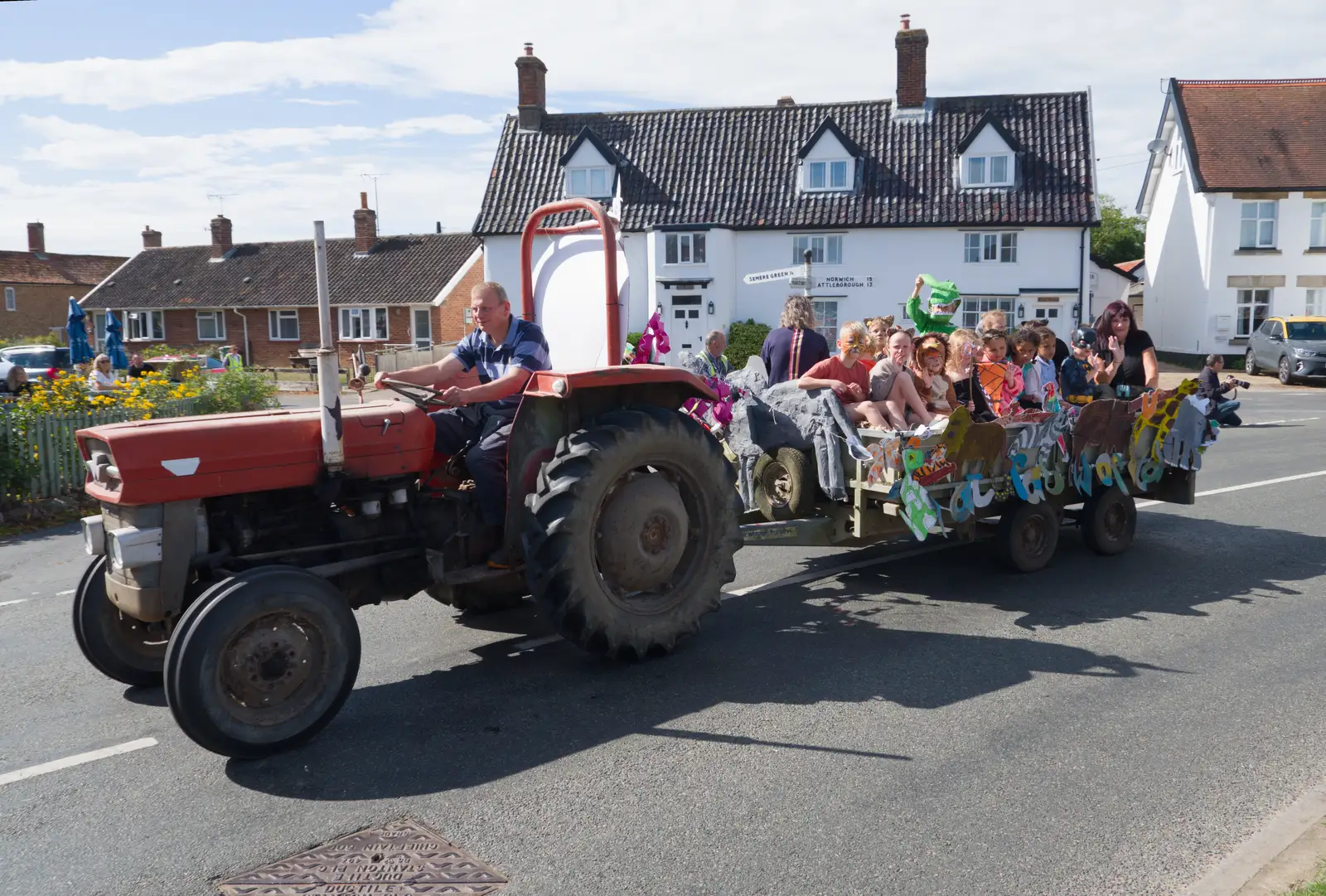 A trailer pulled by an old Massey-Ferguson, from The GSB at the Carnival, Pulham Market, Norfolk - 12th September 2026
