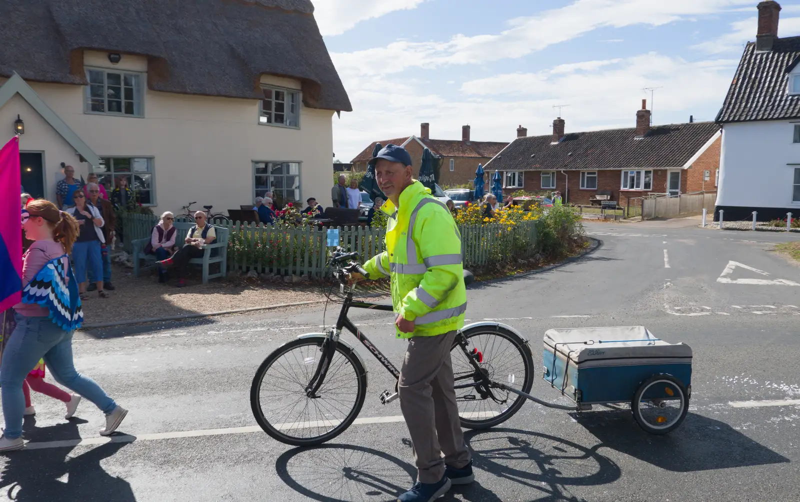 Francis follows the parade with his bike, from The GSB at the Carnival, Pulham Market, Norfolk - 12th September 2026