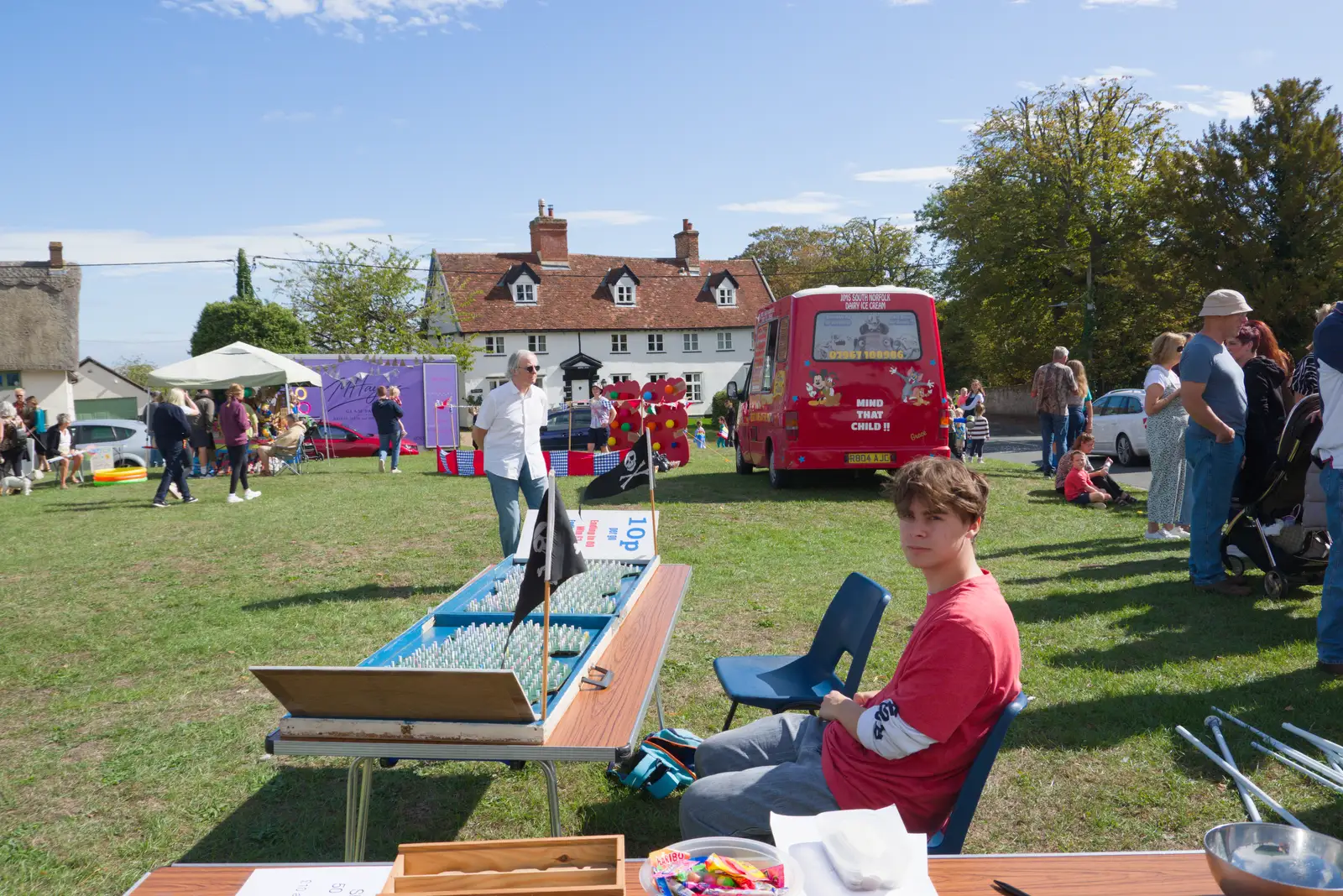 Archie is manning a couple of game stalls, from The GSB at the Carnival, Pulham Market, Norfolk - 12th September 2026