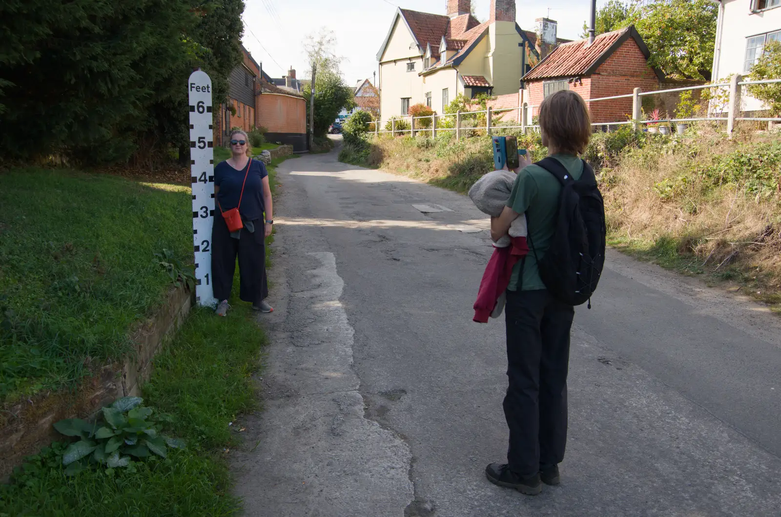 Harry takes a photo as Isobel has a go, from A Walk Around The Lion Pub, Debenham, Suffolk - 4th October 2026