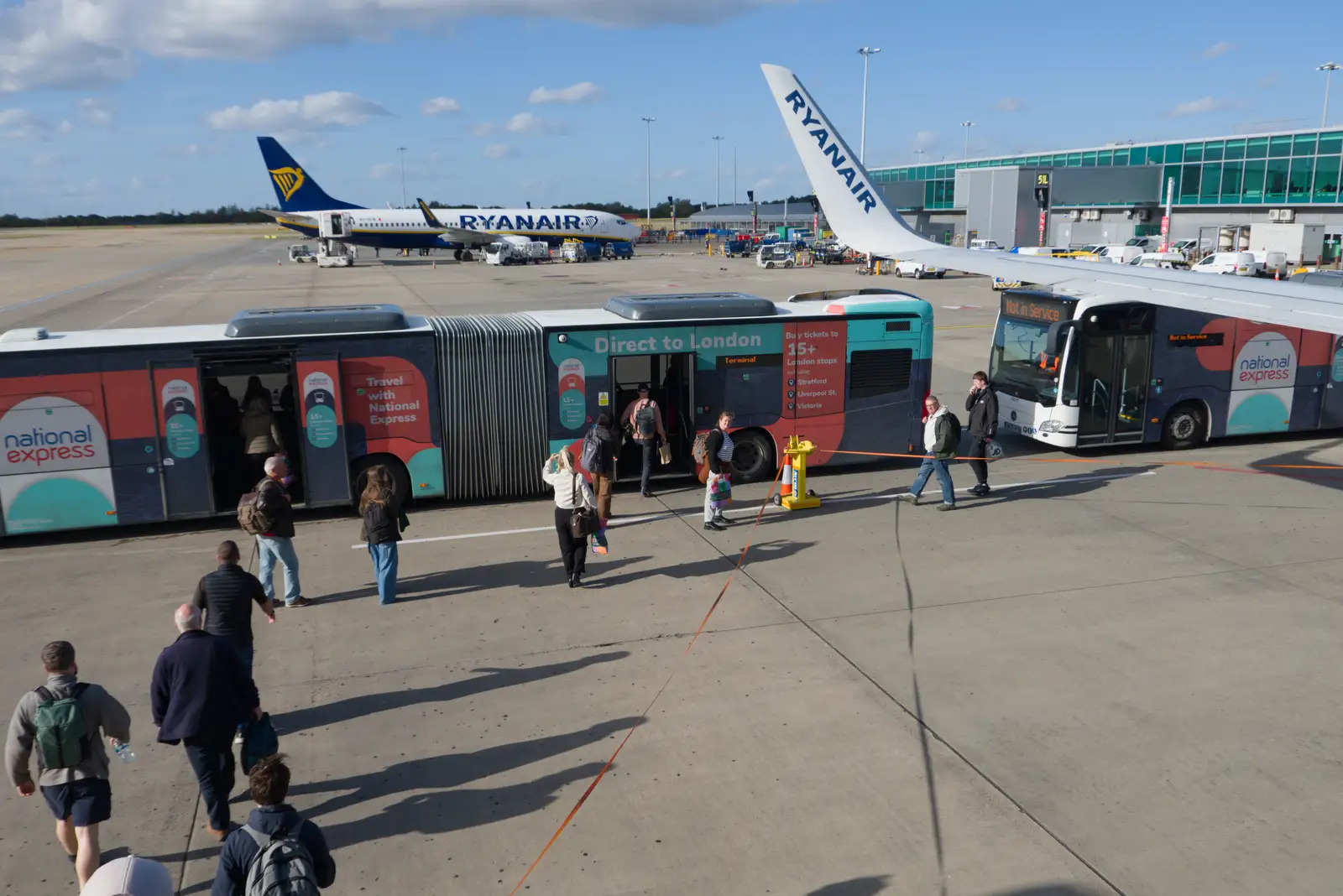 We get dumped onto the bendy buses at Stansted, from An Irish Wake for Louise, Booterstown, Dublin - 11th October 2026