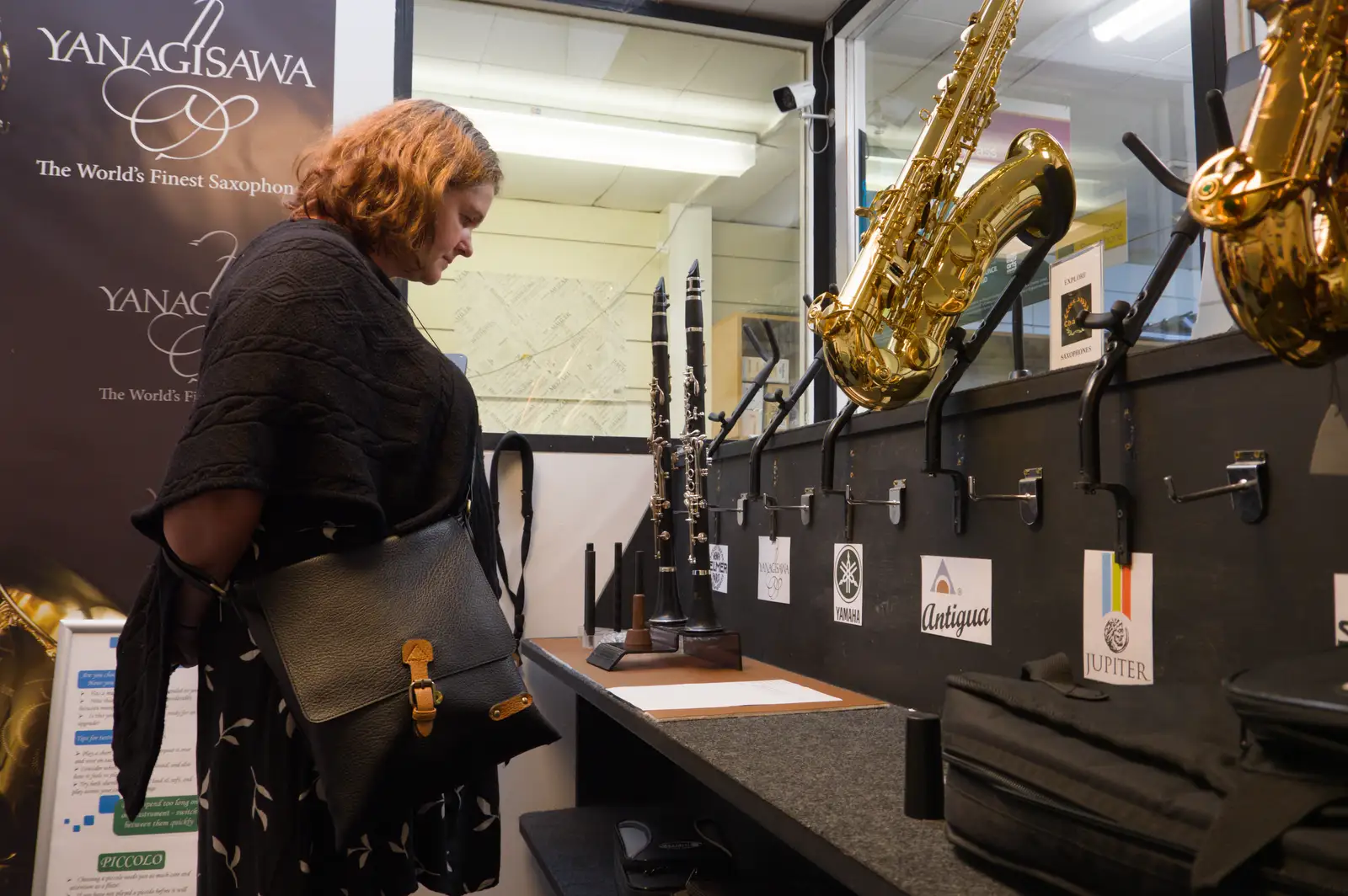 Isobel looks at clarinets, from Another Saxophone Trip, Cambridge - 23rd October 2026